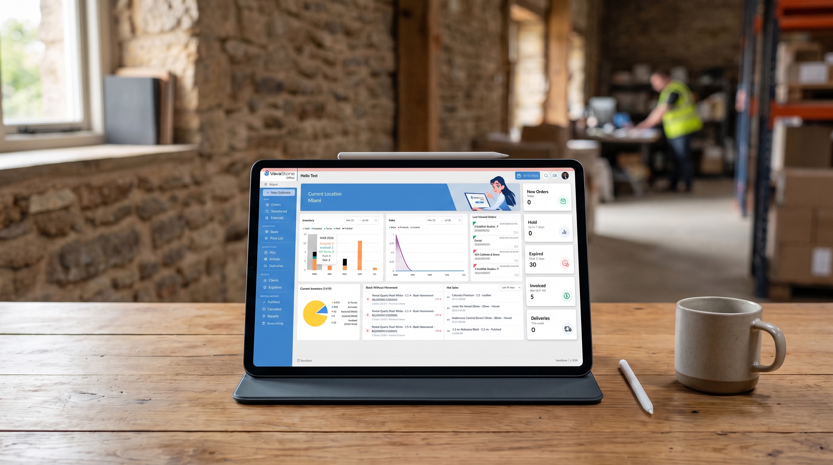 Evaluating stone inventory software options on a laptop